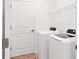 Convenient laundry room with washer and dryer at 15967 Clear Skies Pl, Lakewood Ranch, FL 34211