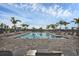 Large community pool with plenty of lounge chairs at 15967 Clear Skies Pl, Lakewood Ranch, FL 34211
