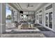 Relaxing poolside patio with comfortable seating and heaters at 15967 Clear Skies Pl, Lakewood Ranch, FL 34211