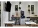 Community coffee bar with coffee machine, tables, and chairs at 15967 Clear Skies Pl, Lakewood Ranch, FL 34211