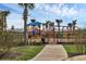 playground with swings and play structures at 15967 Clear Skies Pl, Lakewood Ranch, FL 34211