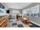 Playroom with ' furniture and view into fitness center at 15967 Clear Skies Pl, Lakewood Ranch, FL 34211