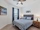 Guest bedroom with a comfortable bed and calming decor at 15967 Clear Skies Pl, Lakewood Ranch, FL 34211
