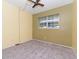 Simple bedroom with neutral walls and carpet flooring at 2465 Northside Dr # 906, Clearwater, FL 33761