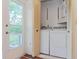 Laundry room with washer, dryer, and exterior access at 2465 Northside Dr # 906, Clearwater, FL 33761