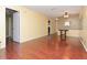 Living room includes wood-look floors and access to other rooms at 2465 Northside Dr # 906, Clearwater, FL 33761