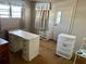 Bedroom with vintage furniture, neutral walls and carpet flooring, awaiting remodel at 3710 Gulf Of Mexico Dr # F1, Longboat Key, FL 34228
