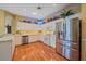 Well-equipped kitchen featuring stainless steel appliances and ample counter space at 7011 Woodmore Ter, Lakewood Ranch, FL 34202