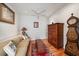 Charming living room with classic decor, wood floors, and comfortable seating arrangement at 7011 Woodmore Ter, Lakewood Ranch, FL 34202