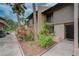Condo building exterior with landscaping and walkway at 947 Sunridge Way # A-3, Sarasota, FL 34234