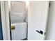 Stackable washer and dryer in a convenient laundry closet at 1720 Glenhouse Dr # Gl428, Sarasota, FL 34231