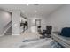 Open concept living room with kitchen and stairs visible at 11655 Bluestone Ct, Parrish, FL 34219