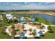 Aerial view of community pool, playground, and clubhouse at 11655 Bluestone Ct, Parrish, FL 34219