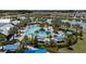 Aerial view of resort-style pool with lounge chairs at 11655 Bluestone Ct, Parrish, FL 34219