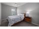 Comfortable bedroom with a queen-size bed and plenty of natural light at 11655 Bluestone Ct, Parrish, FL 34219