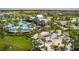 Aerial view of community amenities, including pool and playground at 11655 Bluestone Ct, Parrish, FL 34219