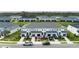 Two-story townhouses with attached garages and manicured landscaping at 11655 Bluestone Ct, Parrish, FL 34219