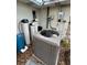 Outdoor AC unit and water filtration system at 431 Foxglove Rd, Venice, FL 34293