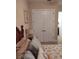 Bedroom with a view of a large closet and bathroom from the bed at 11776 Angler'S Club Dr, Placida, FL 33946