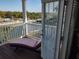 Relaxing balcony overlooking the marina with water views at 11776 Angler'S Club Dr, Placida, FL 33946