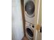 Stackable washer and dryer in a closet at 11776 Angler'S Club Dr, Placida, FL 33946