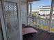 Private balcony with water views and lounge chair at 11776 Angler'S Club Dr, Placida, FL 33946