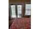 Bedroom with private balcony access and coastal decor at 11776 Angler'S Club Dr, Placida, FL 33946