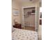 Spacious walk-in closet with shelving and hanging rods at 11776 Angler'S Club Dr, Placida, FL 33946