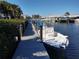 Private boat dock with a view of the canal at 11776 Angler'S Club Dr, Placida, FL 33946