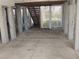 Gravel parking area under the house with access to storage at 11776 Angler'S Club Dr, Placida, FL 33946
