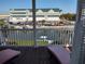 Balcony overlooking the marina and parking area at 11776 Angler'S Club Dr, Placida, FL 33946