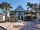 Two-story light blue building near the pool at 11776 Angler'S Club Dr, Placida, FL 33946
