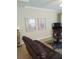 Relaxing living room featuring comfortable seating and a large TV at 11776 Angler'S Club Dr, Placida, FL 33946