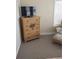 Bedroom with dresser and TV, carpeted floor at 11776 Angler'S Club Dr, Placida, FL 33946