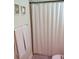 Guest bathroom with shower and neutral-toned towels at 11776 Angler'S Club Dr, Placida, FL 33946