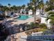 Steps leading down to the refreshing community pool at 11776 Angler'S Club Dr, Placida, FL 33946