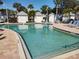 Inviting community pool with ample deck space at 11776 Angler'S Club Dr, Placida, FL 33946