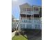 Two-story house with white columns and a balcony at 11776 Angler'S Club Dr, Placida, FL 33946