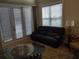 Spacious living area with sliding glass doors leading to a patio or balcony at 11776 Angler'S Club Dr, Placida, FL 33946