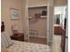 Well-organized walk-in closet with hanging rods and shelves at 11776 Angler'S Club Dr, Placida, FL 33946