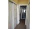 Hallway with closets and bathroom access at 11776 Angler'S Club Dr, Placida, FL 33946