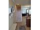 Staircase leading to the second floor and living area at 11776 Angler'S Club Dr, Placida, FL 33946