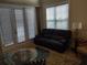 Relaxing living room with comfortable seating and large windows at 11776 Angler'S Club Dr, Placida, FL 33946