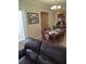 Dining area with a table and chairs, offering a view of the kitchen at 11776 Angler'S Club Dr, Placida, FL 33946