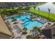 Large community pool with plenty of deck space for lounging at 13816 Miranese St, Venice, FL 34293