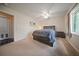 Bright bedroom featuring a ceiling fan and neutral color palette at 15 Tulane Rd, Venice, FL 34293