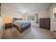 Spacious bedroom with carpeted floor and ample closet space at 15 Tulane Rd, Venice, FL 34293