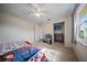 Charming bedroom with a ceiling fan and ample natural light at 15 Tulane Rd, Venice, FL 34293