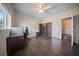 Well-lit bedroom with wood flooring and built-in shelving at 15 Tulane Rd, Venice, FL 34293