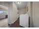 Bright laundry room with washer, dryer, and ample storage at 15 Tulane Rd, Venice, FL 34293